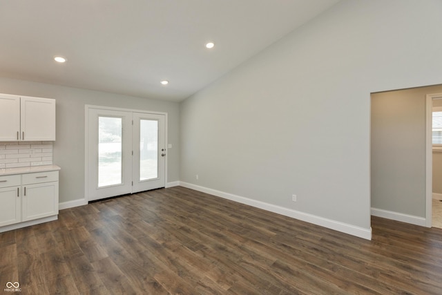 3204 N County Road 900 E, Seymour, IN 47274 - unfurnished living room featuring dark wood-style flooring, recessed lighting, and vaulted ceiling