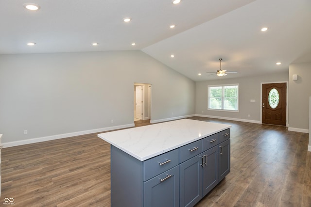 3204 N County Road 900 E, Seymour, IN 47274 - kitchen with open floor plan, a ceiling fan, vaulted ceiling, dark wood-style flooring, and a center island