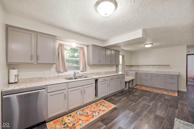 106 N Jamalee Way, Pendleton, IN 46064 - kitchen featuring dishwasher, gray cabinetry, a sink, a textured ceiling, and light countertops