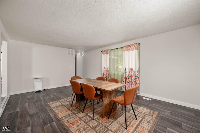 106 N Jamalee Way, Pendleton, IN 46064 - dining area with wood finished floors, a textured ceiling, and baseboards