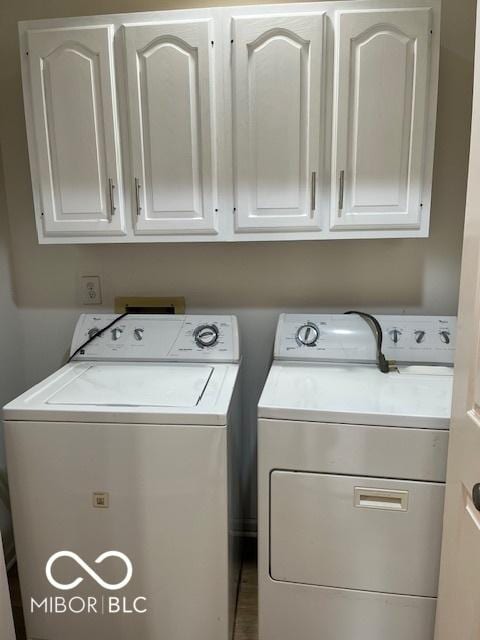 7707 River Rd Unit 10, Indianapolis, IN 46240 - washroom with independent washer and dryer and cabinet space