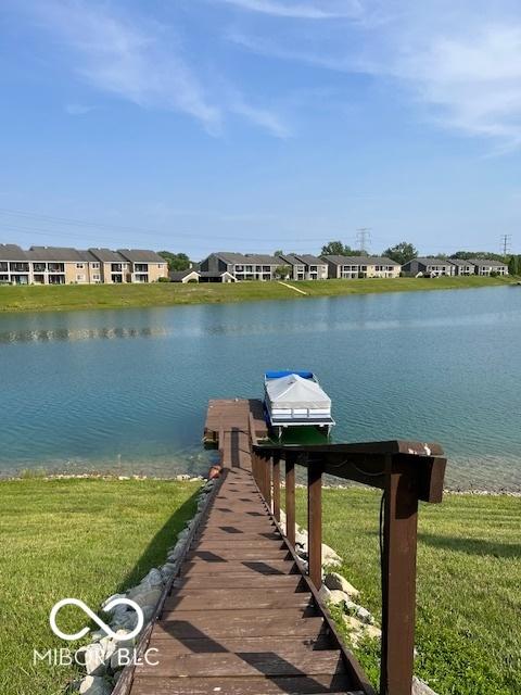 7707 River Rd Unit 10, Indianapolis, IN 46240 - dock area featuring a water view, a yard, and a residential view