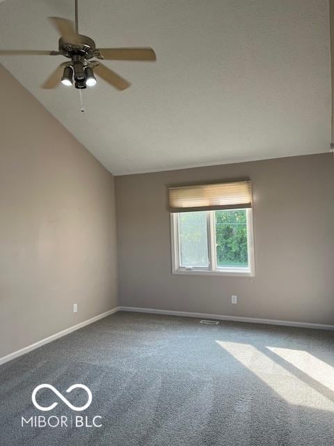 7707 River Rd Unit 10, Indianapolis, IN 46240 - unfurnished room featuring carpet flooring, a ceiling fan, baseboards, and lofted ceiling