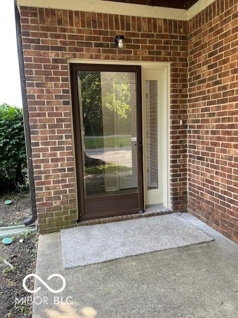 7707 River Rd Unit 10, Indianapolis, IN 46240 - entrance to property featuring brick siding