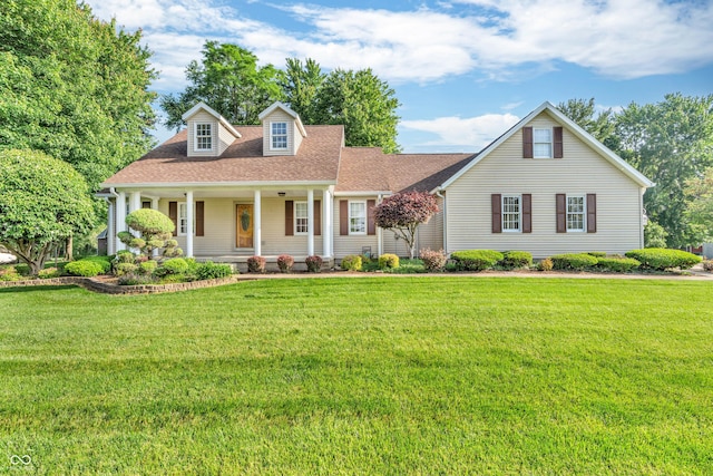6605 N Private Road 110 W, Brazil, IN 47834 - cape cod home featuring covered porch, a front lawn, and a shingled roof