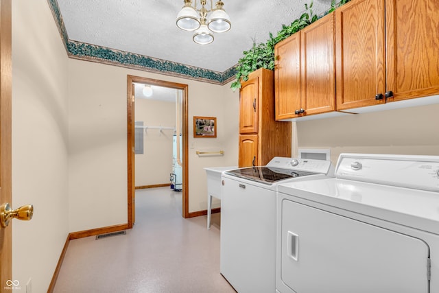 6605 N Private Road 110 W, Brazil, IN 47834 - laundry room with separate washer and dryer, cabinet space, a chandelier, and a textured ceiling