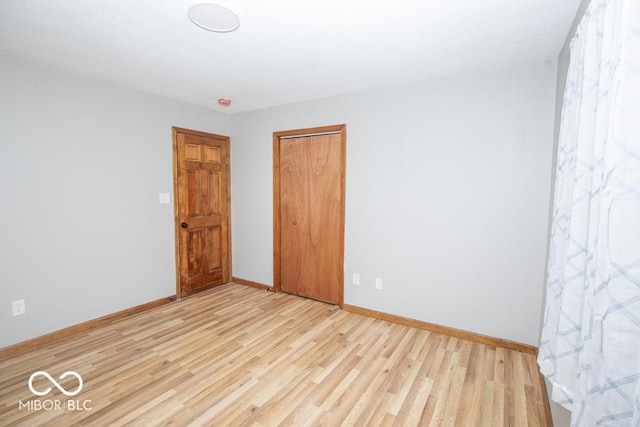 5840 N State Highway 7, Scipio, IN 47273 - spare room featuring light wood finished floors and baseboards