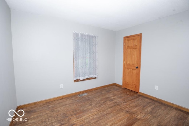 5840 N State Highway 7, Scipio, IN 47273 - unfurnished room with wood finished floors and baseboards