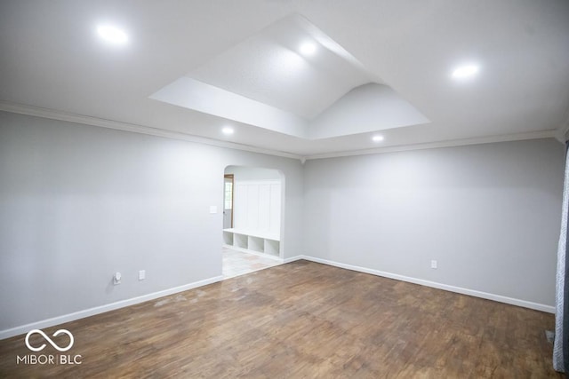 5840 N State Highway 7, Scipio, IN 47273 - spare room with arched walkways, recessed lighting, ornamental molding, wood finished floors, and baseboards