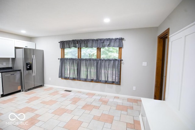 5840 N State Highway 7, Scipio, IN 47273 - kitchen with stainless steel appliances, white cabinets, recessed lighting, and baseboards