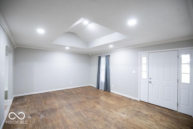 5840 N State Highway 7, Scipio, IN 47273 - foyer entrance featuring ornamental molding, wood finished floors, recessed lighting, baseboards, and arched walkways