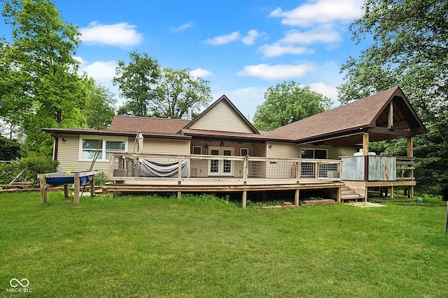 5116 W County Road 450 S, Coatesville, IN 46121 - back of house featuring a yard, a deck, and roof with shingles