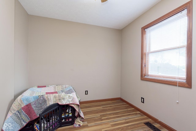 5110 S State Ave, Indianapolis, IN 46227 - bedroom featuring light wood finished floors and baseboards