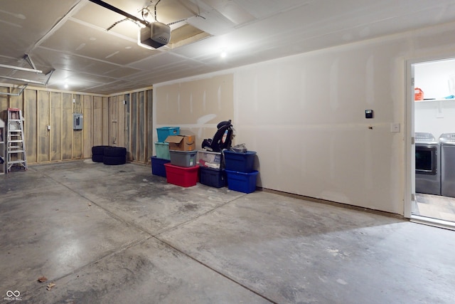 1819 Quiet Haven Cir, Indianapolis, IN 46229 - garage featuring washing machine and clothes dryer and a garage door opener