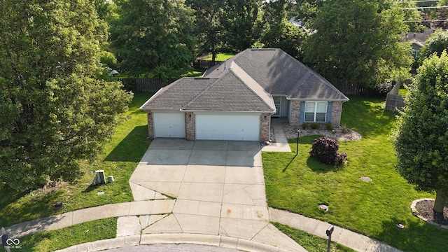 1819 Quiet Haven Cir, Indianapolis, IN 46229 - view of front of house featuring driveway, a garage, brick siding, and a shingled roof