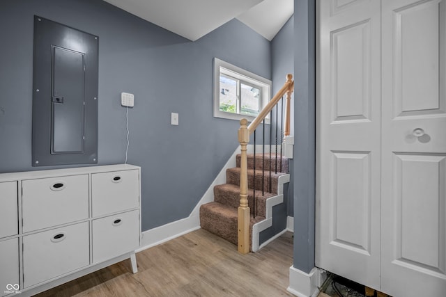 1529 E Tabor St, Indianapolis, IN 46203 - stairway featuring electric panel, wood finished floors, and baseboards