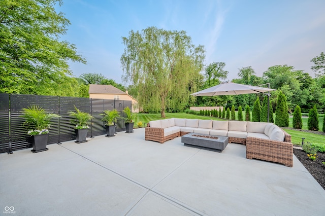 8703 Gordonshire Dr, Indianapolis, IN 46278 - fenced backyard featuring an outdoor living space with a fire pit and a patio