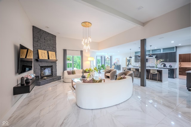 8703 Gordonshire Dr, Indianapolis, IN 46278 - living area with a fireplace, beam ceiling, light marble finish floors, and a chandelier