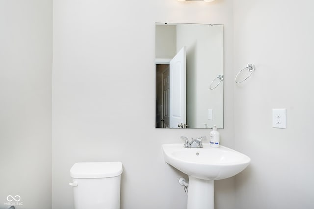 5335 Rum Cherry Way, Indianapolis, IN 46237 - bathroom with toilet and a sink