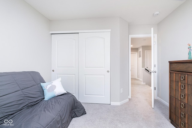 5335 Rum Cherry Way, Indianapolis, IN 46237 - bedroom featuring light colored carpet and a closet