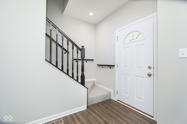 5335 Rum Cherry Way, Indianapolis, IN 46237 - entryway with dark wood finished floors, stairway, and recessed lighting