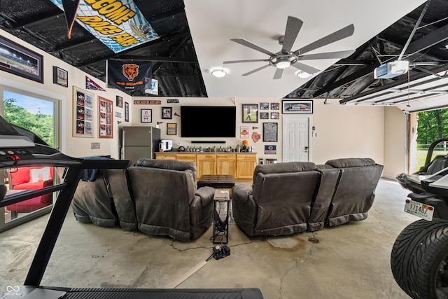 8426 N Chickadee Dr, Morgantown, IN 46160 - home theater room featuring unfinished concrete flooring and ceiling fan
