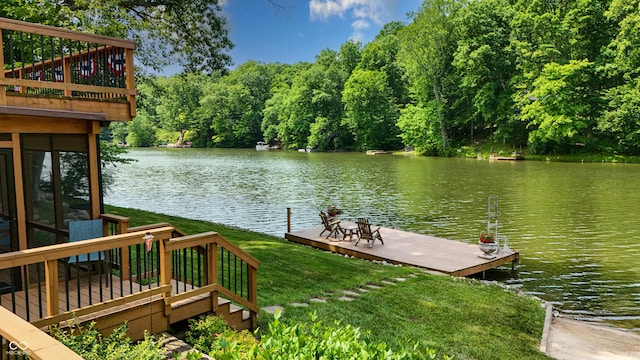 8426 N Chickadee Dr, Morgantown, IN 46160 - dock area featuring a water view, a lawn, and a view of trees