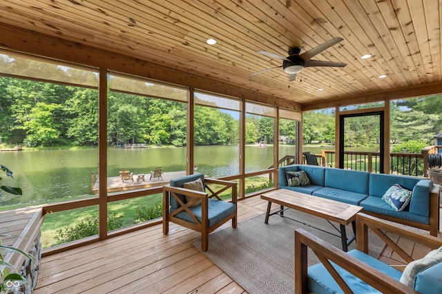 8426 N Chickadee Dr, Morgantown, IN 46160 - sunroom featuring outdoor lounge area, a water view, ceiling fan, and view of wooded area