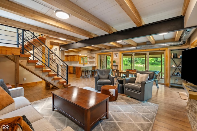 8426 N Chickadee Dr, Morgantown, IN 46160 - living area with light wood finished floors, stairway, and beam ceiling