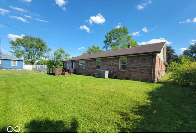 724 Iroquois St, Anderson, IN 46012 - rear view of house featuring brick siding and central AC unit