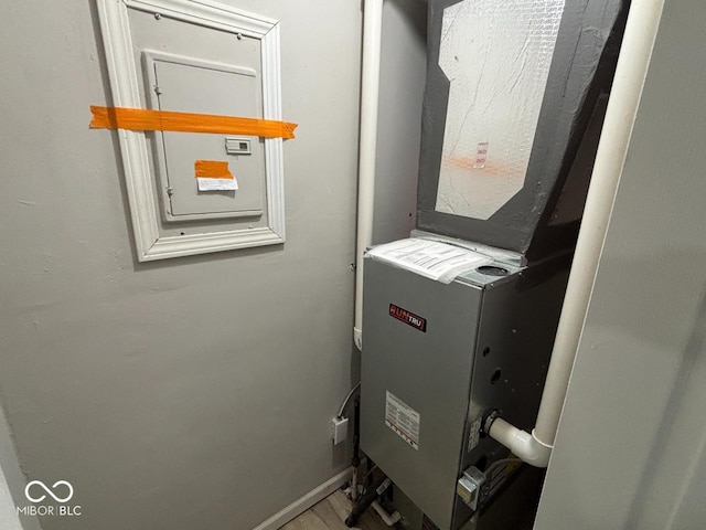 724 Iroquois St, Anderson, IN 46012 - utility room with heating unit and electric panel