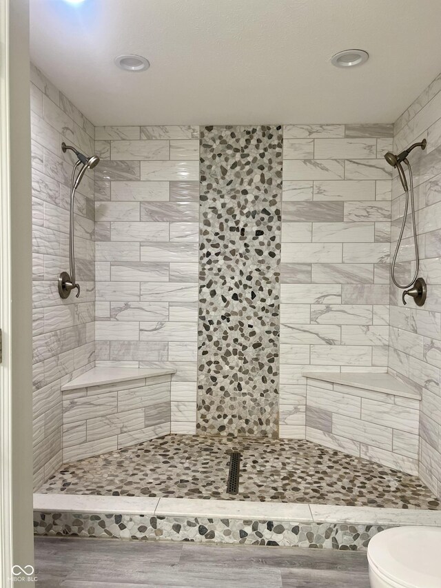 7532 Perilla Ct, Indianapolis, IN 46237 - full bath with toilet, tiled shower, recessed lighting, and wood finished floors