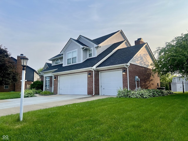 7532 Perilla Ct, Indianapolis, IN 46237 - view of front of property with a front yard, brick siding, a chimney, and driveway