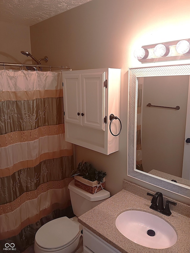 18851 Wimbley Way, Noblesville, IN 46060 - bathroom with vanity, a textured ceiling, and a shower with curtain