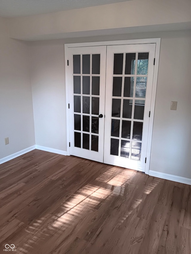 18851 Wimbley Way, Noblesville, IN 46060 - unfurnished room featuring french doors and wood finished floors