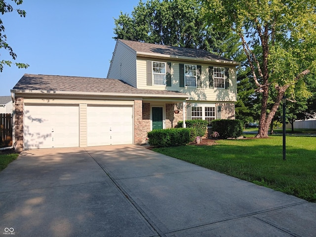 18851 Wimbley Way, Noblesville, IN 46060 - view of front of house featuring an attached garage, driveway, brick siding, a front lawn, and a shingled roof