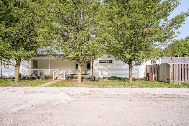 307 E 5th St, Sheridan, IN 46069 - view of property hidden behind natural elements featuring covered porch