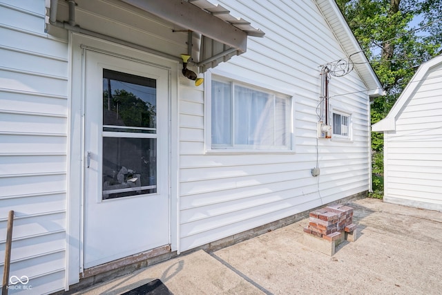 307 E 5th St, Sheridan, IN 46069 - view of exterior entry with a patio area