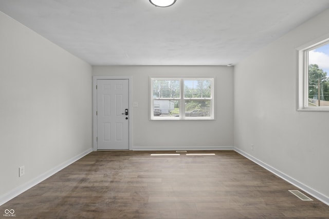 1948 Bloyd Ave, Indianapolis, IN 46218 - entryway featuring plenty of natural light and wood finished floors
