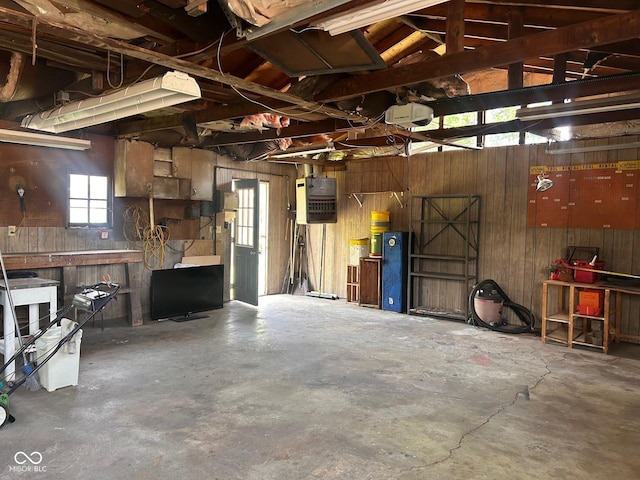 712 Cottage Ave, Anderson, IN 46012 - garage featuring wood walls and a workshop area