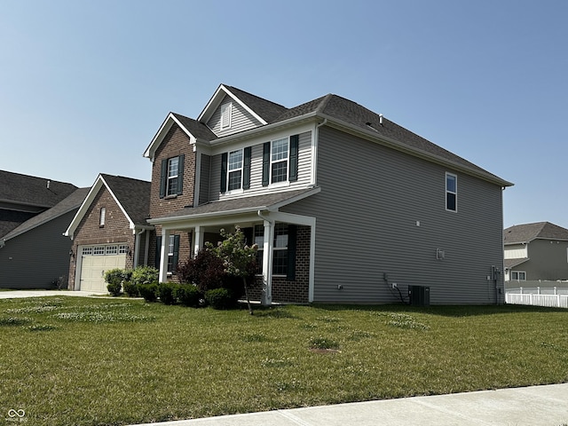 1218 Bedford Dr, Avon, IN 46123 - view of front of home with a garage, a front lawn, a porch, and brick siding
