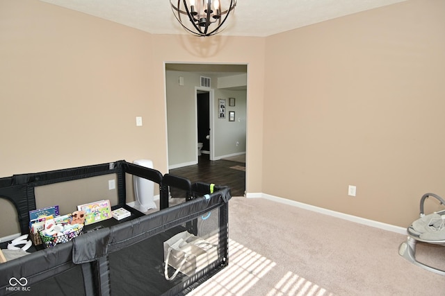 680 Albermarle Dr, Pittsboro, IN 46167 - bedroom featuring a chandelier, baseboards, and carpet flooring