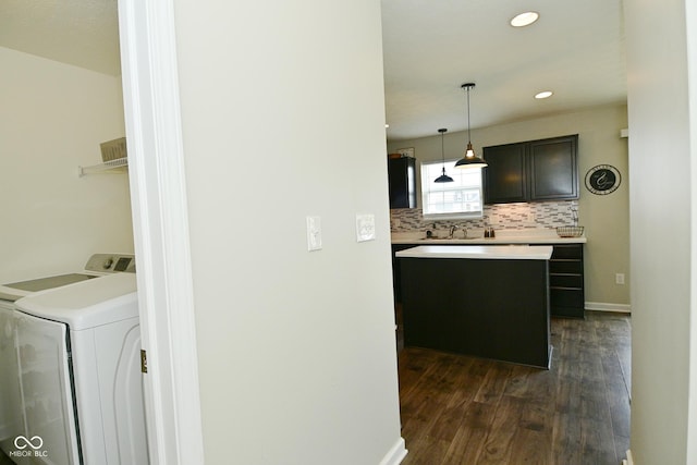 680 Albermarle Dr, Pittsboro, IN 46167 - washroom featuring dark wood-style floors, independent washer and dryer, recessed lighting, and baseboards