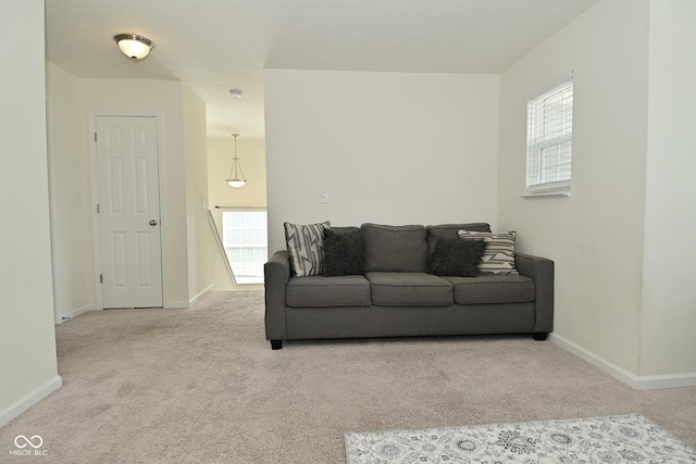 680 Albermarle Dr, Pittsboro, IN 46167 - living area featuring carpet flooring, healthy amount of natural light, and baseboards