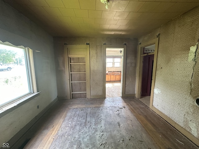1739 E 18th St, Anderson, IN 46016 - empty room with hardwood / wood-style floors and baseboards