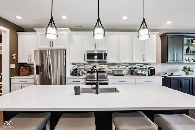 1295 Maclaren Ct, Franklin, IN 46131 - kitchen with stainless steel appliances, a sink, open shelves, hanging light fixtures, and recessed lighting