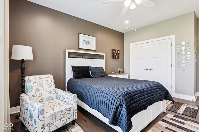 1295 Maclaren Ct, Franklin, IN 46131 - bedroom featuring wood finished floors, a ceiling fan, a closet, and baseboards