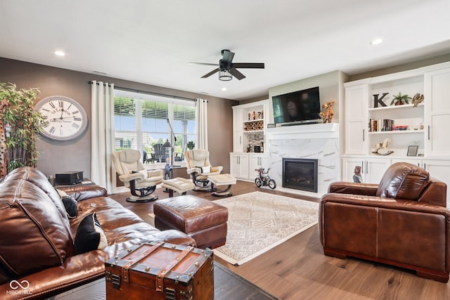 1295 Maclaren Ct, Franklin, IN 46131 - living area with a ceiling fan, wood finished floors, a fireplace, and recessed lighting