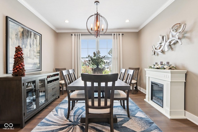 1295 Maclaren Ct, Franklin, IN 46131 - dining room with a chandelier, dark wood-type flooring, crown molding, baseboards, and recessed lighting
