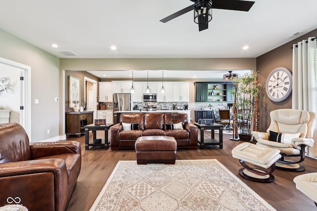 1295 Maclaren Ct, Franklin, IN 46131 - living area with ceiling fan, recessed lighting, dark wood-type flooring, and baseboards